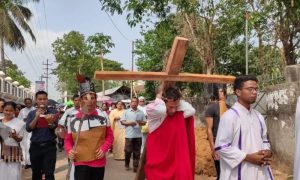 On Good Friday. Christian participating in outdoor activities carrying crosses and singing.